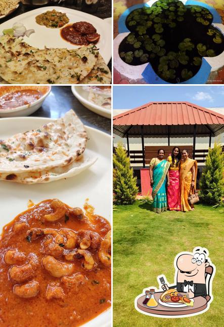 Get pizza at HOTEL BRINDAVAN