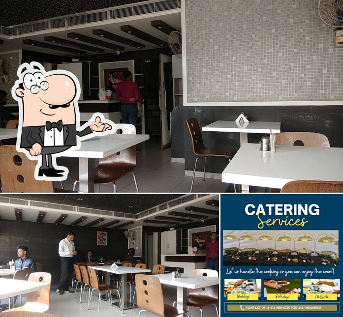 Standard Sweets And Restaurant is distinguished by interior and exterior