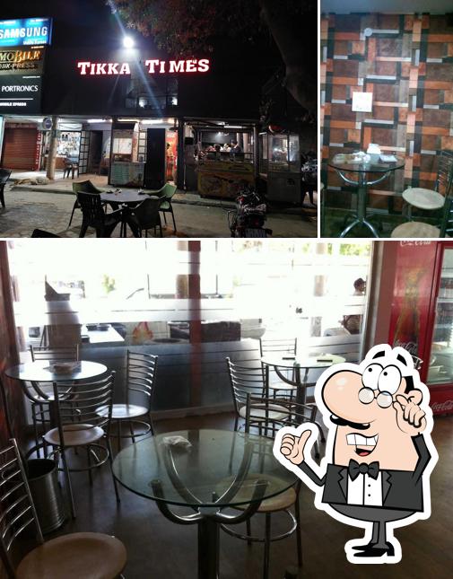 Take a seat at one of the tables at Tikka Times veg. Restro