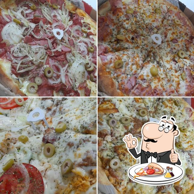 No TOP PIZZA ASSADA - DIVINÓPOLIS, você pode degustar pizza