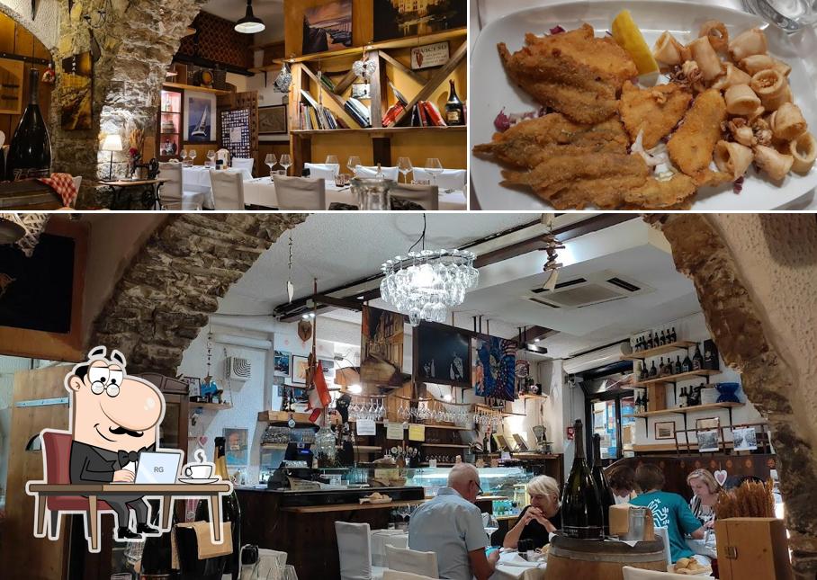 Dai un’occhiata alla foto che raffigura la interni e cibo di Al Porton