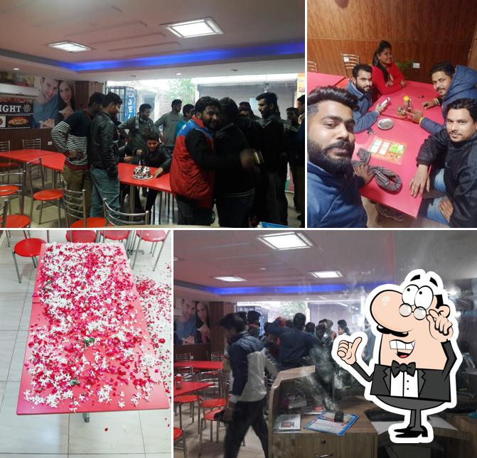 Take a seat at one of the tables at Delight pizza