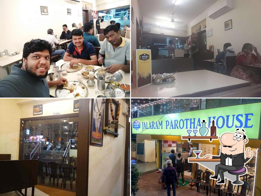 Take a seat at one of the tables at Jalaram Parotha House