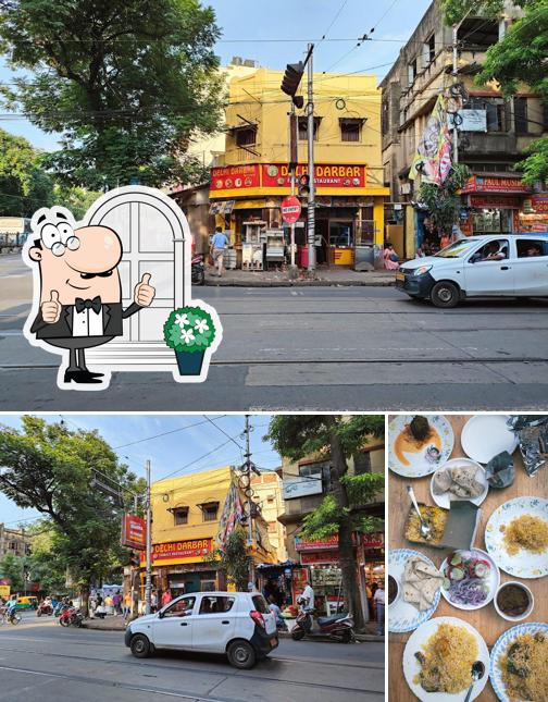 Take a look at the photo showing exterior and interior at Delhi Darbar Restaurant