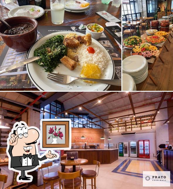 Sente em uma das mesas no Bar e Restaurante Prato Food Hall