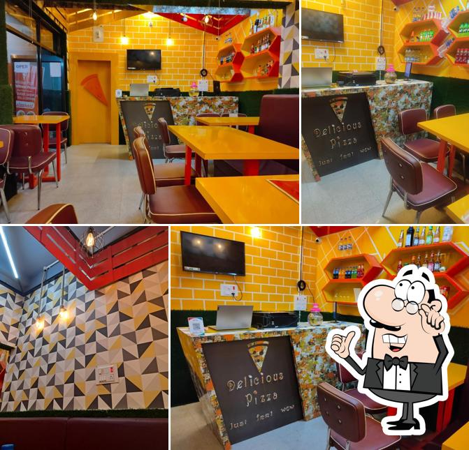 The interior of Delicious Pizza