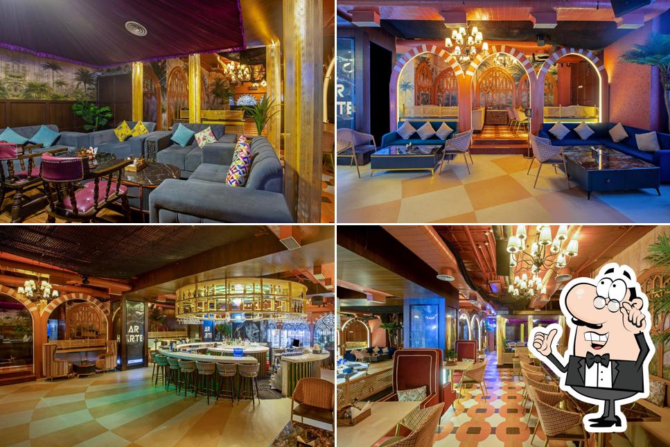 Take a seat at one of the tables at My Bar Headquarters