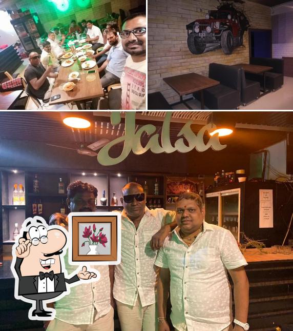 Take a seat at one of the tables at Maahi Resto Bar