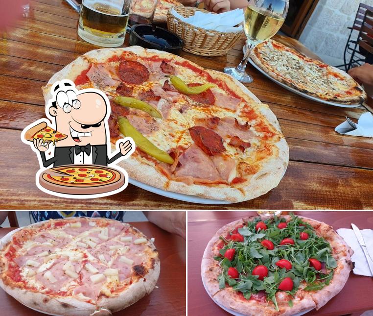 Prenditi una pizza a PIZZERIA RIVA