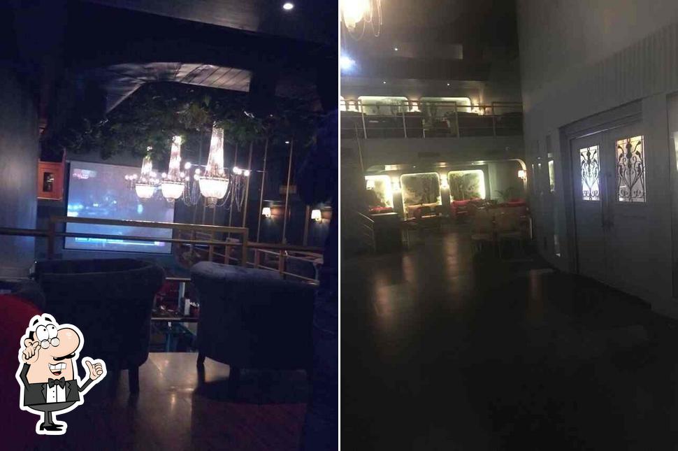 Take a seat at one of the tables at Reverb Rooftop Cookhouse & Bar