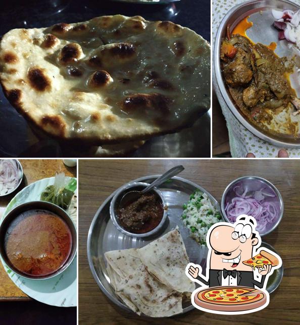 Get pizza at Mahima Foods