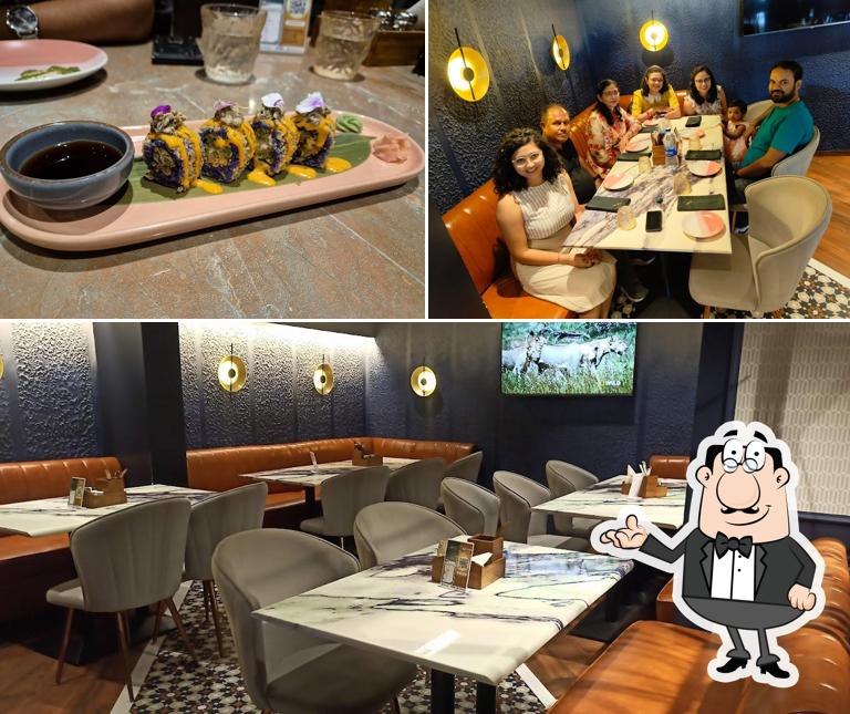 Take a seat at one of the tables at LYKE : All day eatery and bar