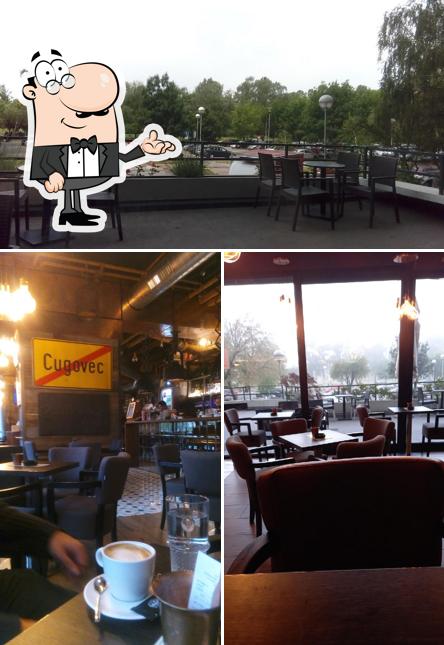 Dai un'occhiata agli interni di Cafe Cotton +