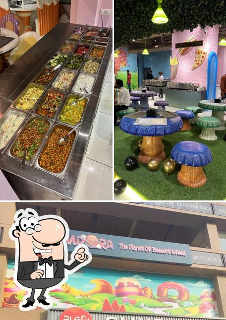 Take a seat at one of the tables at Pemdora