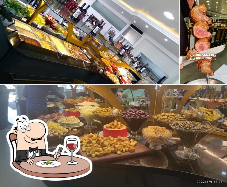 Comida em Churrascaria Boi Dourado