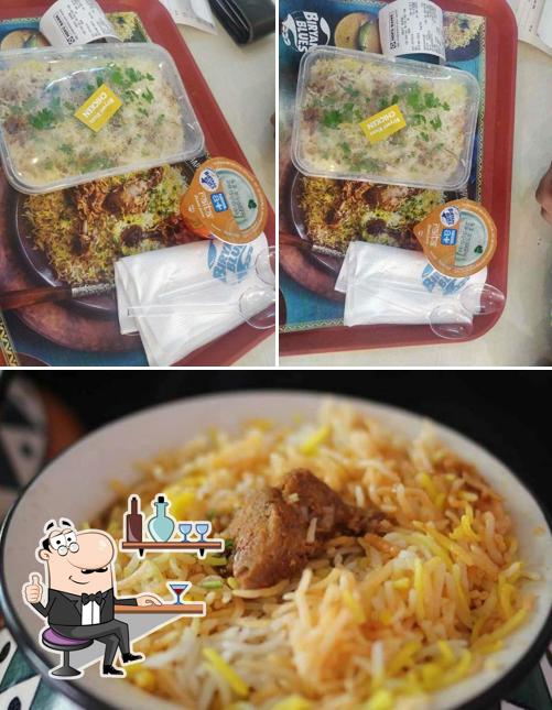 The photo of interior and food at Biryani Blues