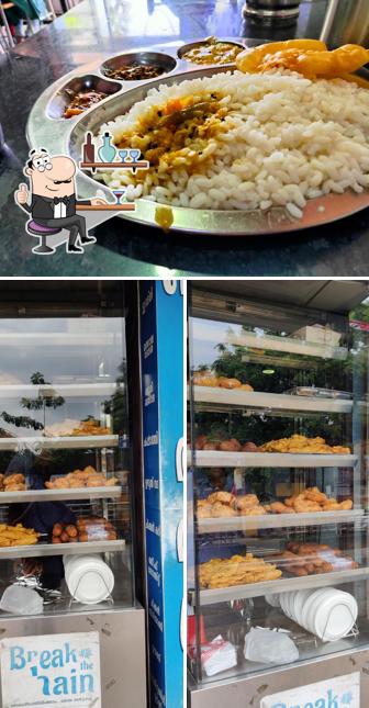 Check out the image showing interior and food at Samrat Veg and Non-Veg Restaurant