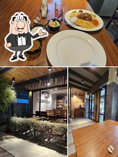 Take a seat at one of the tables at ABOOKKA MAKKAANI MANDI & GRILLS