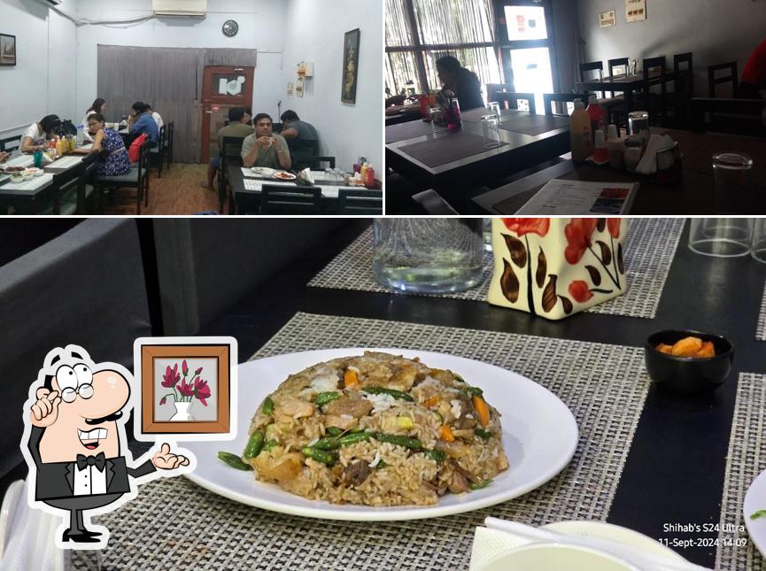 Among various things one can find interior and food at North East Kitchen ( Specialty Cuisine Restaurant )