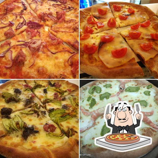 A Pizzerie Dai Tati, puoi prenderti una bella pizza