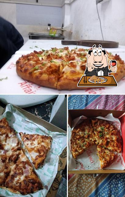 Try out pizza at Chicken Affair