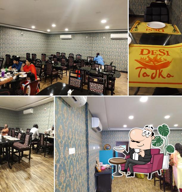 Take a seat at one of the tables at Desi Tadka - Pure Vegetarian North Indian Restaurant