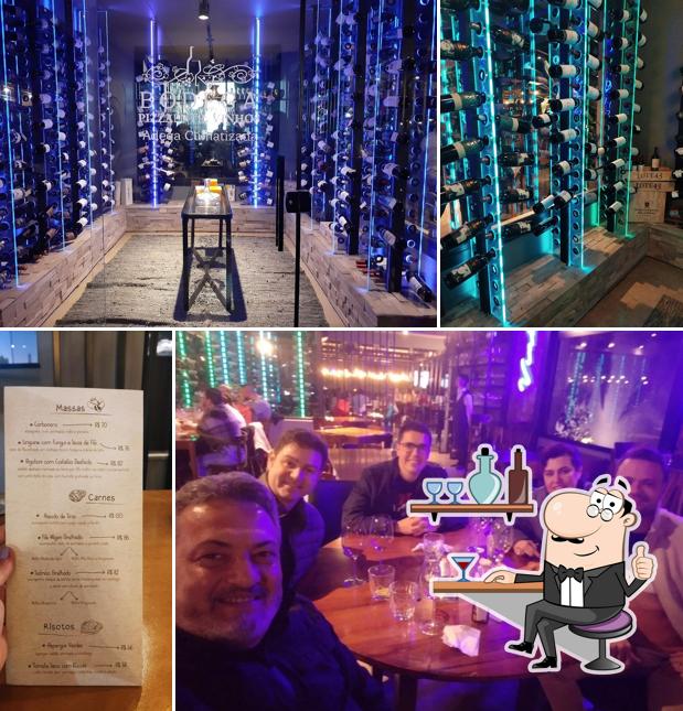 Veja imagens do interior do Bodega Pizza Entre Vinhos