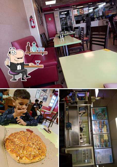 Take a seat at one of the tables at Domino's Pizza Civil Lines , Bareilly