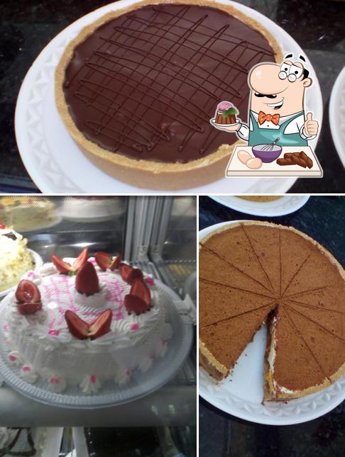Panificadora E Confeitaria Pedacinho Do Céu serve uma escolha de sobremesas
