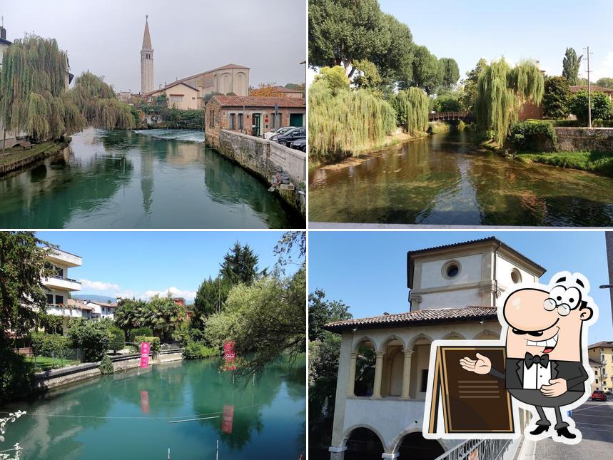 Puoi goderti l'aria fresca da seduto all'esterno di Antica Sacile