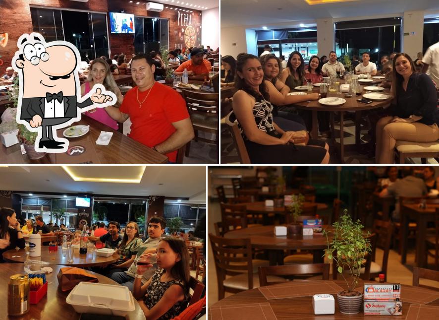 O interior do Metru's Pizzaria