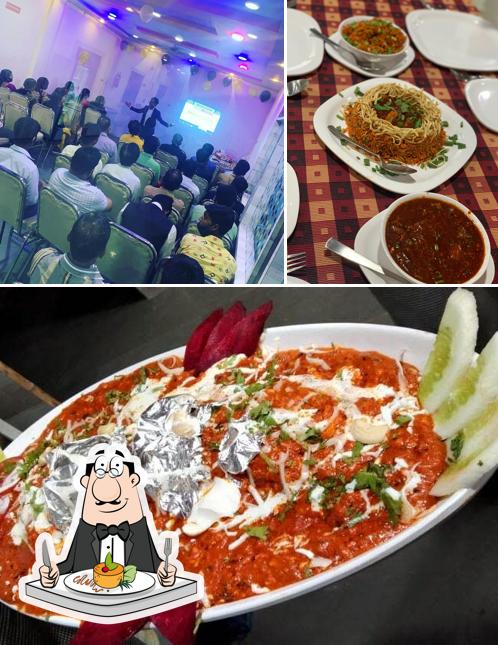 Take a look at the photo depicting food and interior at Hotel Vedant - Pure Veg Restaurant