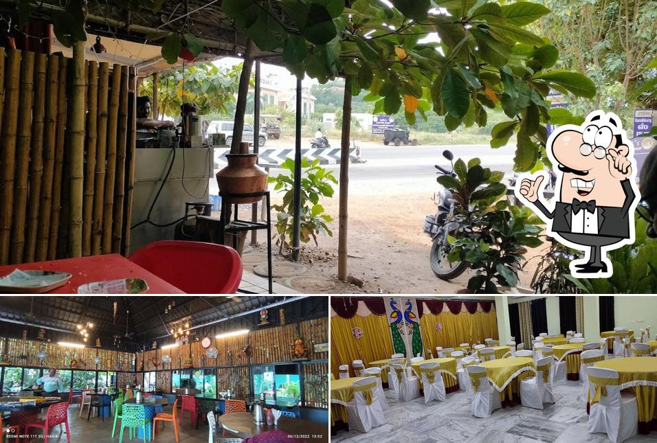 Take a seat at one of the tables at Moto Space Restaurant & party Hall A/C