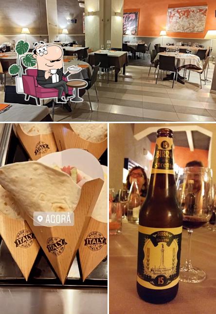 La immagine di interni e birra da Ristorante Pizzeria Agorà