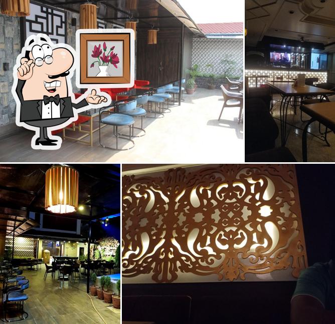 Take a seat at one of the tables at BMS Club Bar Primo Restaurant