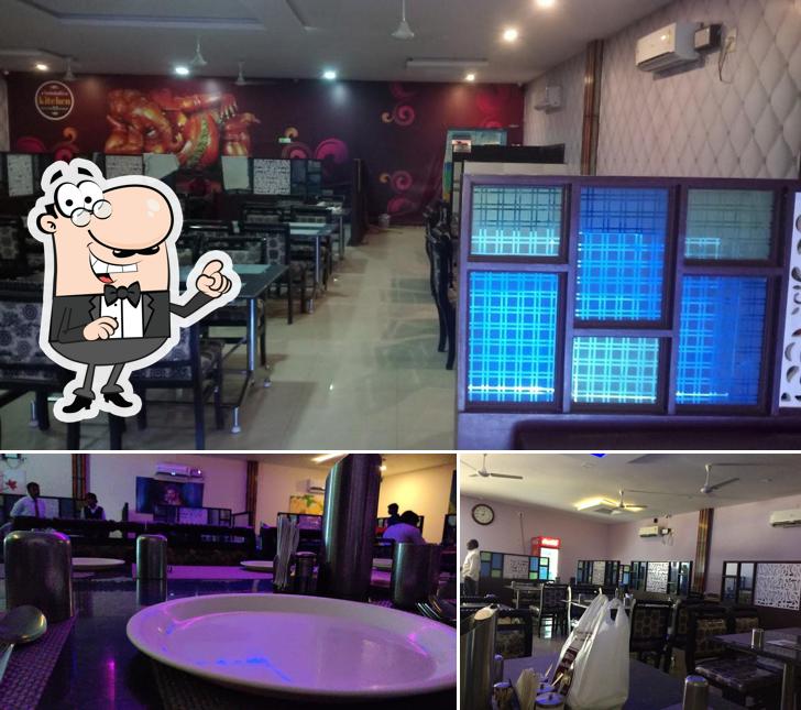 Take a seat at one of the tables at Bahubali's Kitchen