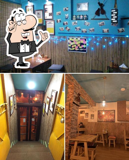 Take a seat at one of the tables at Hornbill Restaurant