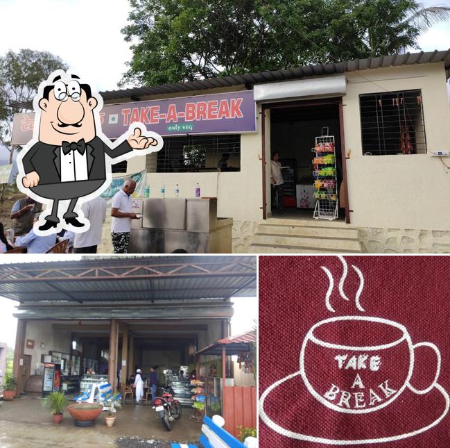 Take a seat at one of the tables at TAKE-A-BREAK (Only Veg)