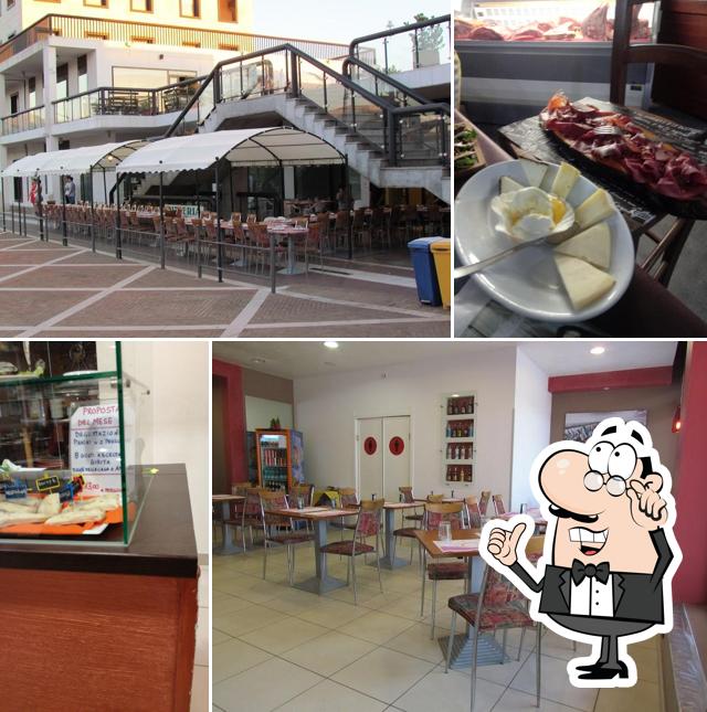 Dai un'occhiata agli interni di Pizzeria Rusty Scottadito