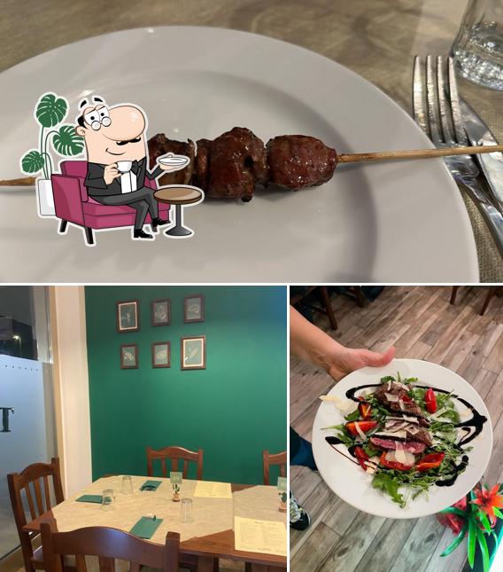 Dai un’occhiata alla foto che mostra la interni e cibo di Trattoria Magnezitt'