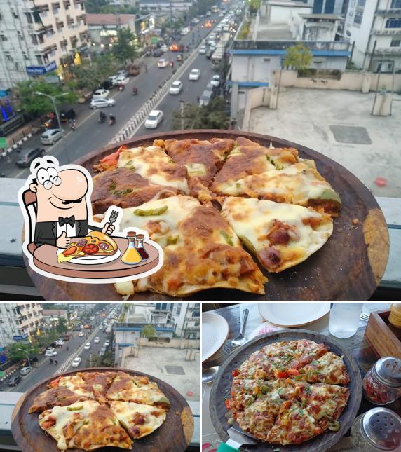 Try out pizza at Attic : The Restro Cafe