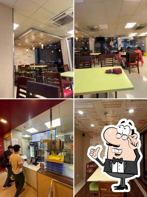 The interior of Domino's Pizza Koonamthai, Edappally