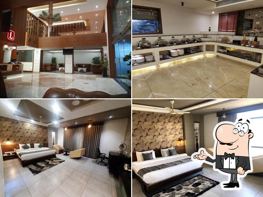 Take a seat at one of the tables at Lords Eco Inn Morbi