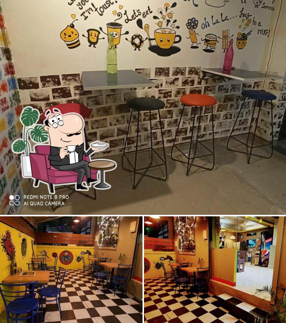 Take a seat at one of the tables at Cafe Happingo