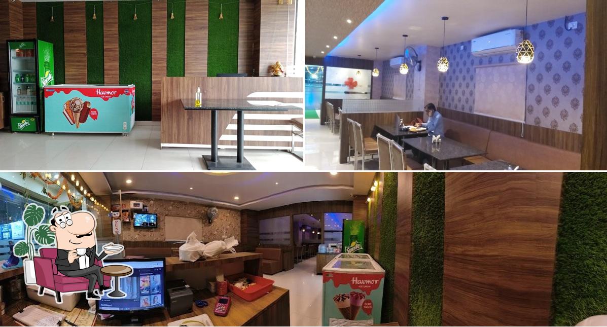 Take a seat at one of the tables at Balaji Santosh Dhaba narsingi