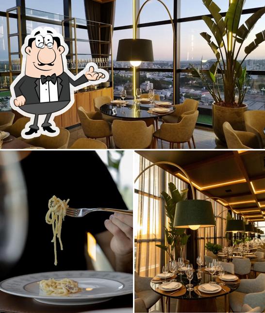 Sente em uma das mesas no Pê05 Terrazza di Primo Camilo