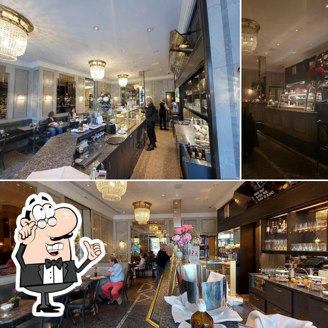 Siediti a un tavolo di Café Gourmet