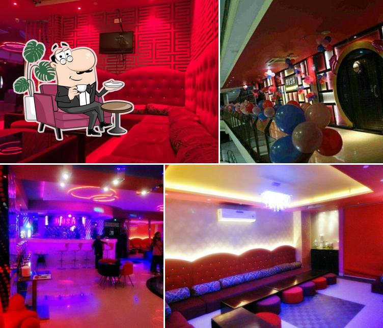 Take a seat at one of the tables at Club Rush