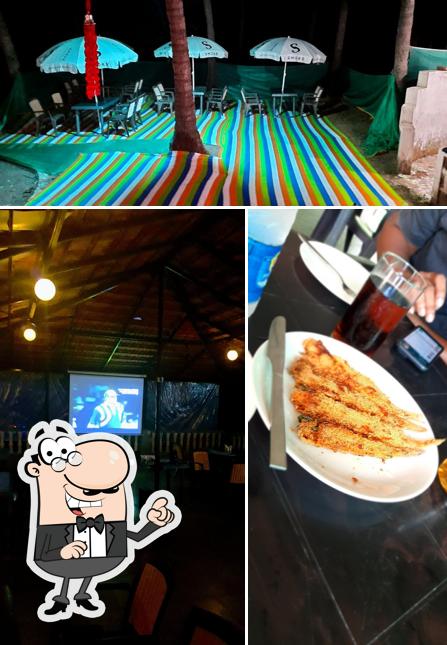 The photo of interior and fries at Red Chilli Family Restaurant & Bar