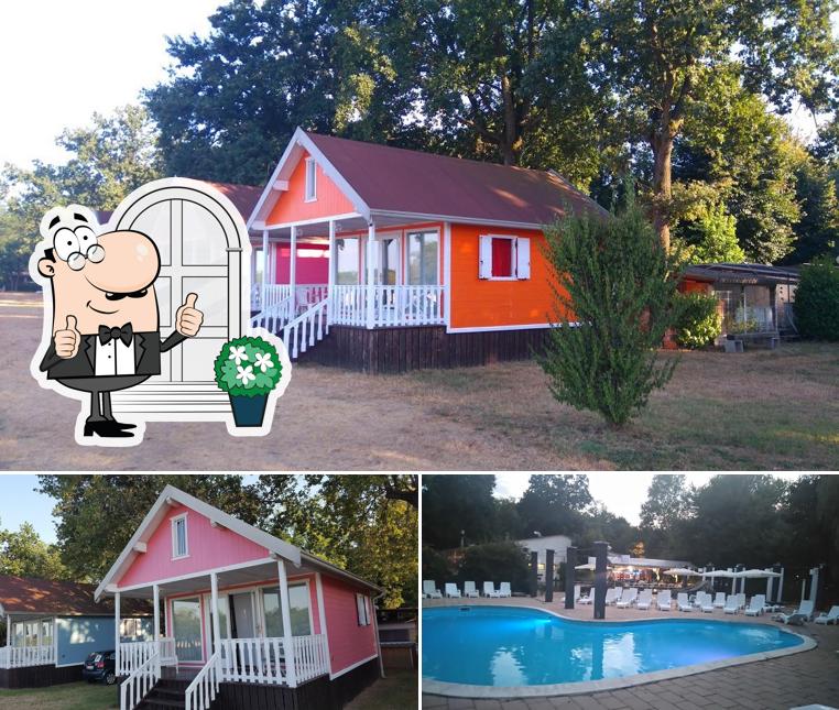 Puoi goderti l'aria fresca da seduto all'esterno di Camping Playa di Valverde campeggio galliate